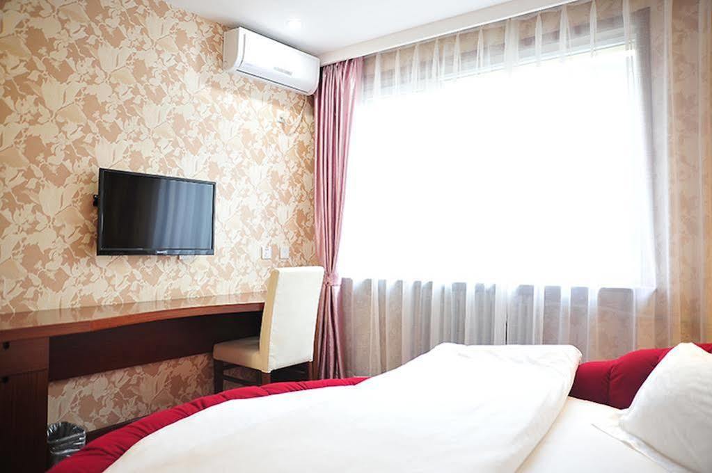 East Sacred Hotel Beijing Exterior photo